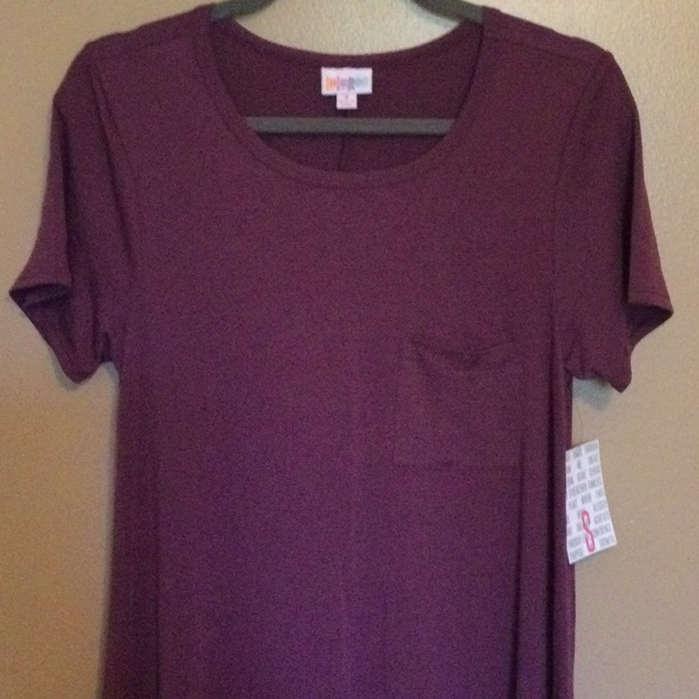 New with tags Lularoe Carly Dress, size Small. Solid purple plum color